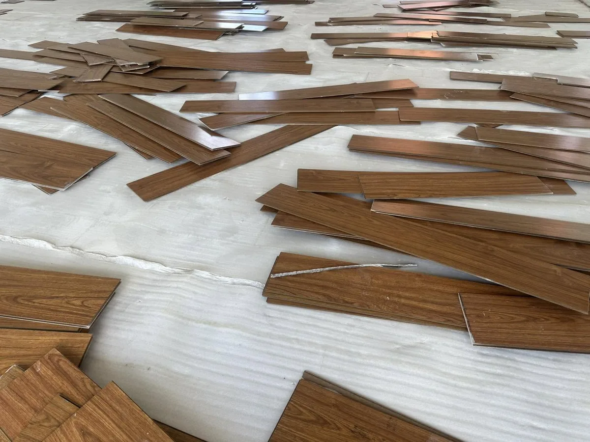 Team fitting the studio mirrors