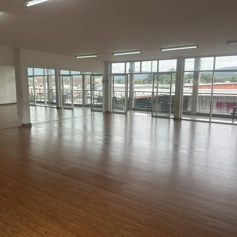 Glass doors along the studio with mountains beyond